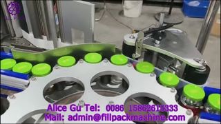 2129 M4 เครื่องติดฉลากแบบหมุนอัตโนมัติสำหรับขวดแก้วฝาเกลียวสามตัวพร้อมฉลากติดในตัว