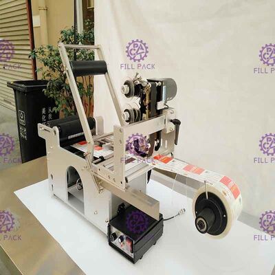 เครื่องติดฉลากขวดกลมแบบกาว เครื่องติดฉลากขวดกึ่งอัตโนมัติ