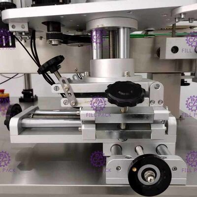 เครื่องติดฉลากขวดกลมกาวตนเอง เครื่องติดฉลากขวด PET