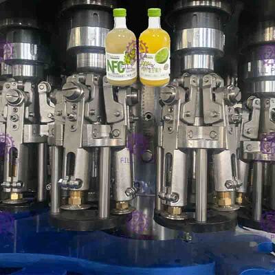 เครื่องบรรจุน้ำผลไม้เข้มข้นความหนืดสูง 0.3L, เครื่องปิดฝาอัตโนมัติ