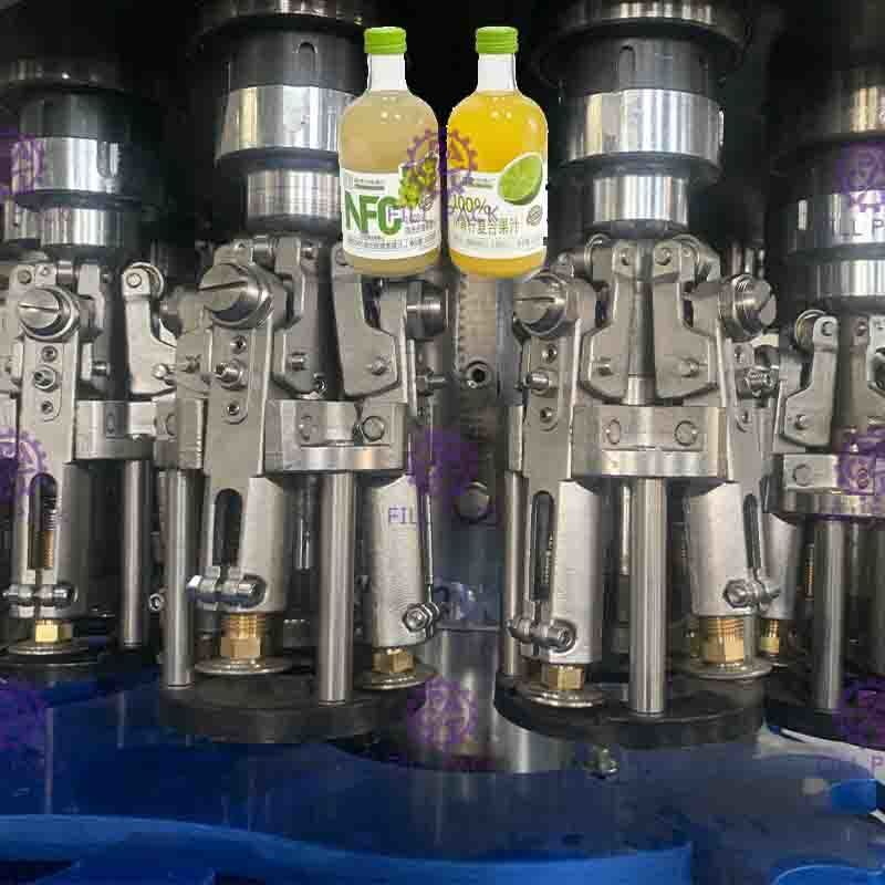 เครื่องบรรจุน้ำผลไม้เข้มข้นความหนืดสูง 0.3L, เครื่องปิดฝาอัตโนมัติ